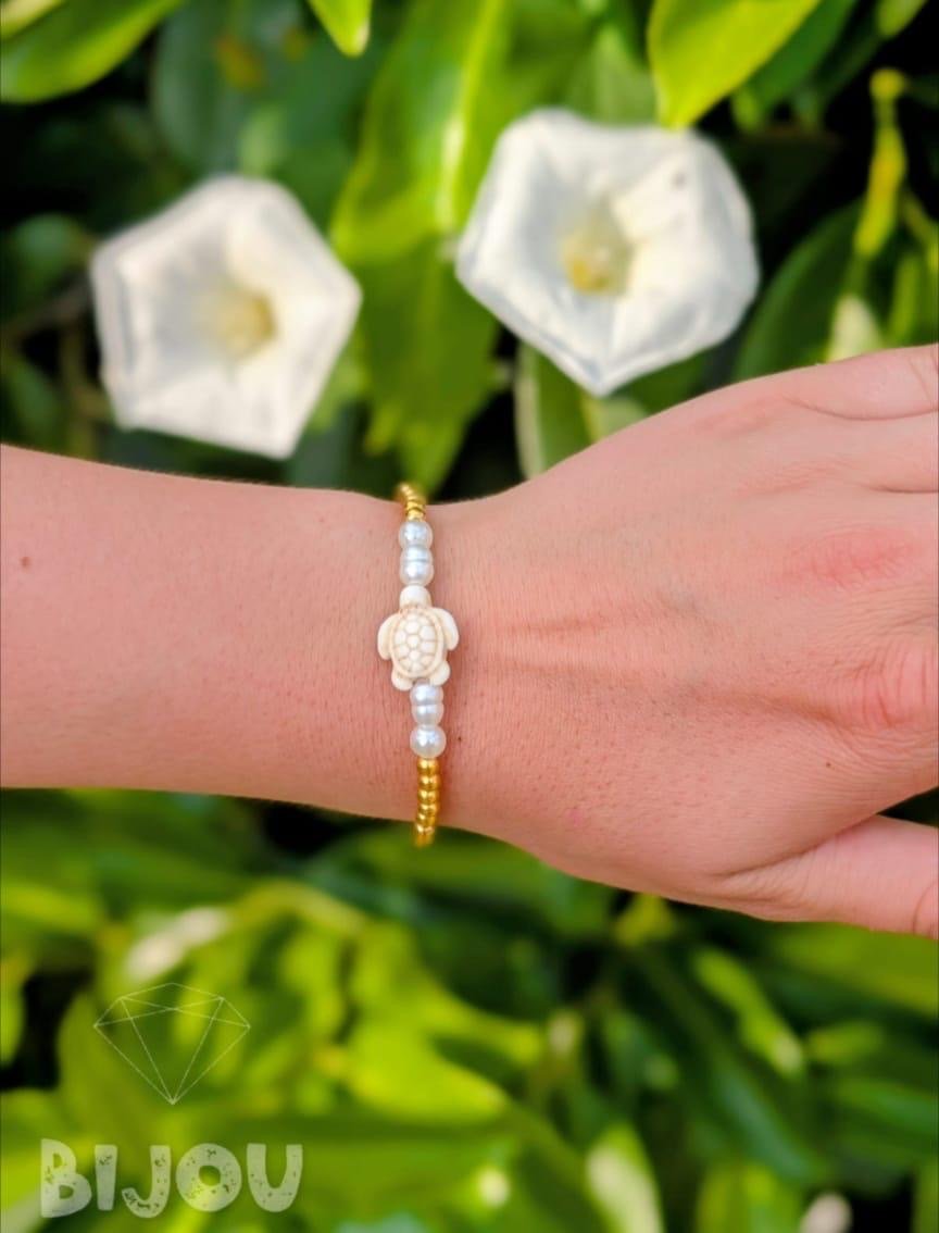 Gold beads and pearls with carved white turtle charm